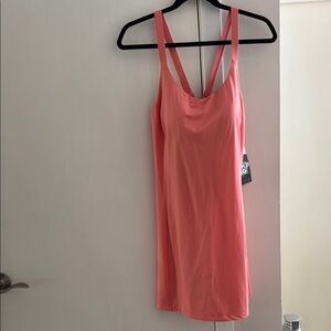 Peach color women’s size 12 new with tags on swimdress. NEW